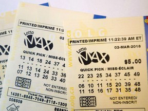 A lotto Max ticket is shown in Toronto on Monday Feb. 26, 2018.