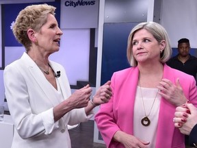 Liberal Premier Kathleen Wynne, centre, Progressive Conservative Leader Doug Ford, left, and NDP Leader Andrea Horwath take part in the Ontario Leaders debate in Toronto on Monday, May 7, 2018. This is the first of three debates scheduled before the June 7 vote.