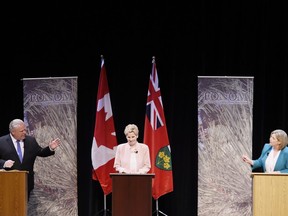 Ontario Progressive Conservative Leader Doug Ford, left to right, Ontario Liberal Leader Kathleen Wynne and Ontario NDP Leader Andrea Horwath take part in the second of three leaders' debate in Parry Sound, Ont., on Friday, May 11, 2018.