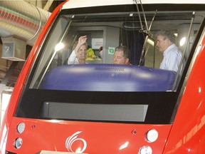 Ontario Liberal leader Kathleen Wynne arrives on the O-Train at a campaign stop in Ottawa on Thursday, May 17, 2018.