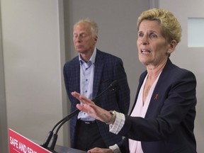 Ontario Liberal Leader Kathleen Wynne takes a question after making an announcement at the Mothers Against Drunk Driving office in Toronto on Tuesday, May 22, 2018. THE CANADIAN PRESS/Chris Young