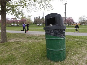 Garbage can at Mooney's Bay Beach in Ottawa Tuesday May 15, 2018. The city of Ottawa is planning to install recycling bins in about 50 parks this year -- the first step in the full implementation of recycling in all parks.