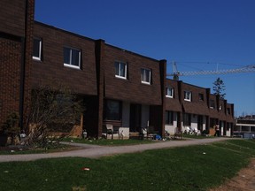 Dwellings along Sandalwood Drive in the Heron Gate community are among those slotted for demolition by the end of the year.