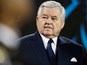 In this Sunday, Jan. 24, 2016 file photo, Carolina Panthers owner Jerry Richardson watches before the NFL football NFC Championship game against the Arizona Cardinals in Charlotte, N.C.