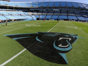 People familiar with the situation say hedge fund manager David Tepper has agreed to buy the Carolina Panthers from team founder Jerry Richardson for a record $2.2 billion. The people spoke to The Associated Press on Tuesday, May 15, 2018, on condition of anonymity because the team has not yet announced the sale. The purchase is subject to a vote at the NFL owners meeting next week in Atlanta. (AP Photo/Mike McCarn)