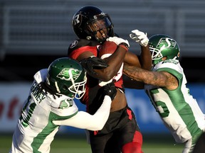 Ottawa Redblacks receiver Dominique Rhymes (centre) shed between 10 to 15 pounds in the off-season. (Justin Tang/The Canadian Press)