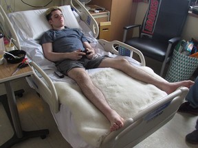 Former Humboldt Broncos player Ryan Straschnitzki takes a break after rehab at Foothills Hospital in Calgary in this photo taken Thursday, May 18, 2018. THE CANADIAN PRESS/Bill Graveland