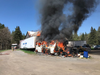 A fire destroyed two mobile homes and several vehicles in North Gower Friday afternoon.