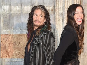 Singer-songwriter Steven Tyler and Liv Tyler attend the Givenchy fashion show during Spring 2016 New York Fashion Week at Pier 26 at Hudson River Park on September 11, 2015 in New York City. (Michael Loccisano/Getty Images)