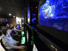Gamers warm-up before playing League of Legends at a SKLeague eSports tournament held at Matrix Gaming Centre in Regina, Sask. on Saturday Nov. 7, 2015.