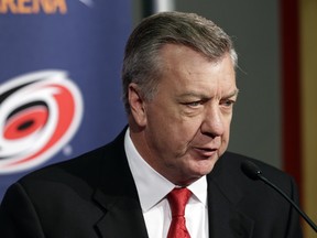 Newly named Carolina Hurricanes General Manager Don Waddell makes comments during an NHL hockey news conference in Raleigh, N.C., Wednesday, May 9, 2018. (AP Photo/Gerry Broome) ORG XMIT: NCGB106