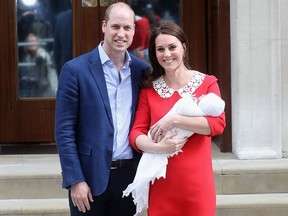 Prince William, Duke of Cambridge and Catherine, Duchess of Cambridge depart the Lindo Wing with their new born son Prince Louis of Cambridge at St Mary's Hospital on April 23, 2018 in London, England. (Chris Jackson/Getty Images)