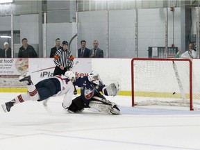 Ottawa Jr. Senators' Conor Smart scores the game-winning goal against the College Francais de Longueuil Friday, May 4, 2018 at the Fred Page Cup.