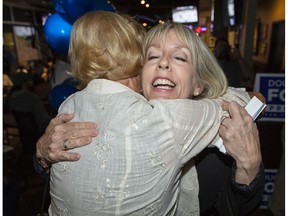 Newly-elected Merrilee Fullerton, right, hugs Bev Johnson at Don Cherry's Sports Grill in Kanata after winning the Kanata-Carleton in the Ontario provincial election Thursday, June 7, 2018.