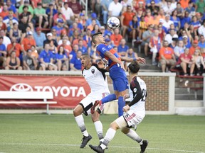 FC Cincinnati and Fury players fight for position of the ball at Nippert Stadium in Cincinnati last night.  FC Cincinnati/photo