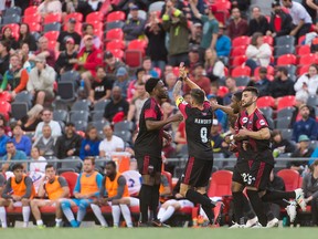 Ottawa's Carl Haworth celebrates his goal with teammates on Wednesday night. (Steve Kingsman/Freestyle Photography/Ottawa Fury FC)