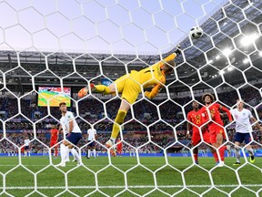 England goalkeepr Jordan Pickford can't stop a shot by Belgium's Adnan Januzaj during Thursday's game. (GETTY IMAGES)