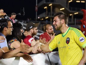 Fury FC goalkeeper Maxime Crépeau exchanges greetings with fans after Wednesday's 3-0 victory against Toronto FC II at TD Place stadium. Steve Kingsman/Freestyle Photography/Ottawa Fury FC