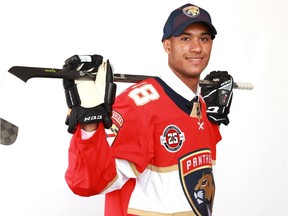 Serron Noel poses after being selected 34th overall by the Florida Panthers.