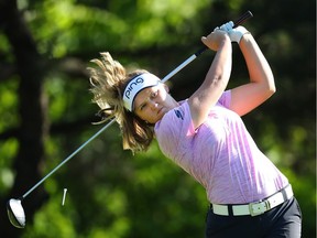 Brooke Henderson follows through on her tee shot on the second hole during Friday's round.