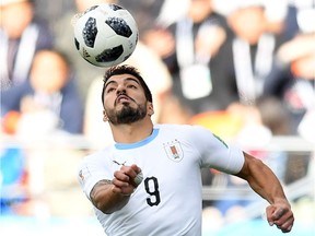 Uruguay's Luis Suarez eyes the ball during the Russia 2018 World Cup Group A match against Egypt in Ekaterinburg on Friday.
