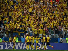 Sweden's players celebrate their opening goal against South Korea during a Russia 2018 World Cup Group F match on Monday.