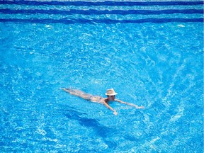 A woman takes a swim.