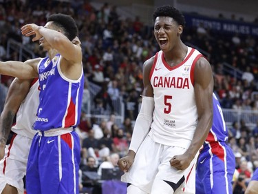 Canada's R. J. Barrett celebrates a basket against the Dominican Republic.