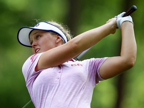 Brooke Henderson tees off on the seventh hole during the first round of the U.S. Women's Open at Shoal Creek, Thursday, May 31, 2018, in Birmingham, Ala. (AP Photo/Butch Dill)