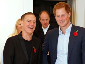 Photographer Bryan Adams and Prince Harry attend the private view of 'Wounded: The Legacy of War' at Somerset House on Remembrance Day, November 11, 2014 in London, England. (Tim P. Whitby-WPA Pool/Getty Images)