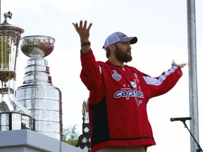 Capitals captain Alex Ovechkin reacts to the crowd during the victory parade and rally at The National Mall.
