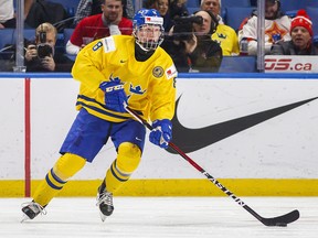 In this Dec. 31, 2017 file photo, Sweden's Rasmus Dahlin skates during the world junior championship game against Russia in Buffalo, N.Y.  (Mark Blinch/The Canadian Press via AP, File)
