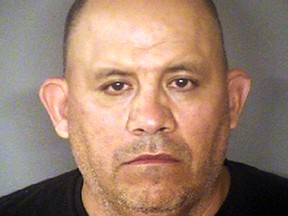 Jose Nunez, a deputy sheriff was arrested Sunday, June 17, 2018, on a warrant for super aggravated sexual assault, pending formal charges. (Bexar County Sheriff Office via AP)