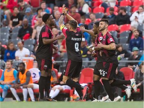 Amway Canadian Championship match between the Ottawa Fury FC and AS Blainville at TD Place Stadium in Ottawa, ON. Canada on June 27, 2018. Ottawa's Carl Haworth celebrates with teammates.