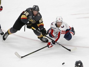 Vegas Golden Knights left wing Erik Haula, (left) and Washington Capitals' Lars Eller vie for the puck during the third period in Game 2 Stanley Cup final on Wednesday, May 30, 2018, in Las Vegas. (AP/PHOTO)