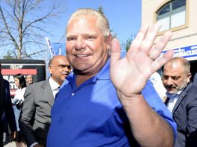 Ontario PC leader Doug Ford leaves a breakfast meet and greet in Ottawa on Saturday, June 2, 2018. THE CANADIAN PRESS/Justin Tang
