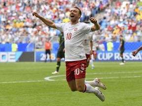 Denmark's Christian Eriksen celebrates after scoring the opening goal during the group C match between Denmark and Australia at the 2018 soccer World Cup in the Samara Arena in Samara, Russia, Thursday, June 21, 2018.