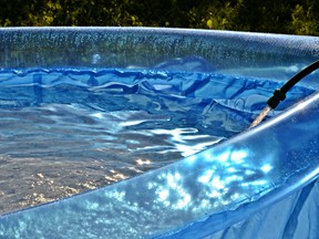Blue inflatable swimming pool
