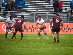 Kanata's Eric Howard, middle, who plays the front-line position of hooker, has played 12 international games for the Canadian senior men's rugby team. Rugby Canada photo