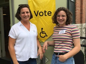 The mother-daughter team Tanya Tremblan and Emilie Tremblay worked for Elections Ontario at a polling station at St. Margaret Mary Church in Ottawa Centre on Thursday. Jacquie Miller/Postmedia