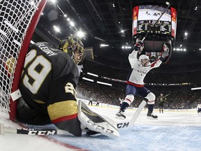 In this May 28, 2018, file photo, Washington Capitals centre Evgeny Kuznetsov, right, celebrates a goal as Vegas Golden Knights goaltender Marc-Andre Fleury sits on the ice in Las Vegas. (Harry How/Pool via AP, File)