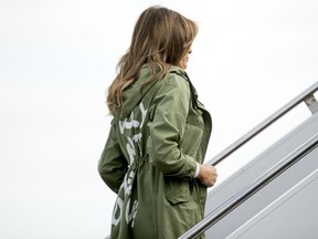 First lady Melania Trump boards a plane at Andrews Air Force Base, Md., Thursday, June 21, 2018, to travel to Texas. (AP Photo/Andrew Hanik)