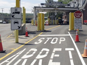 This Aug. 2, 2017 file photo shows the U.S. border crossing post at the Canadian border between Vermont and Quebec at Beecher Falls, Vt.