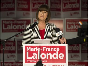 Marie-France Lalonde speaks to supporters in Orléans after winning re-election on Thursday night.