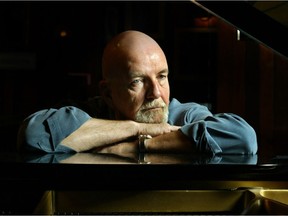 Canadian jazz legend Brian Browne poses for a photo at the Montreal Bistro in Toronto where he was playing piano Oct. 4, 2003.