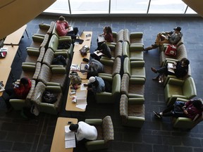 Unidentified Algonquin College students are seen on campus in Ottawa in this photo from March 26.   Tony Caldwell/Postmedia