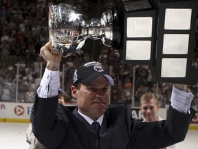 In 2010, then-Hershey Bears assistant coach Troy Mann celebrates the teams Calder Cup championship.