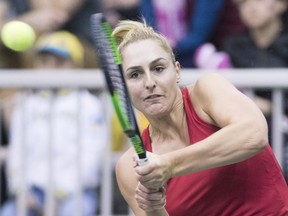Gabriela Dabrowski of Canada returns a shot during their Fed Cup tennis match in Montreal, in this April 22, 2018, file photo.