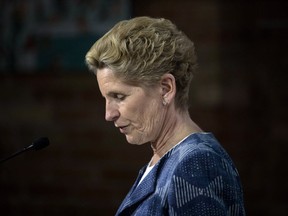 Ontario Liberal Leader Kathleen Wynne takes questions from the media after making a policy announcement during a campaign stop in Toronto, on Thursday, May 24, 2018. THE CANADIAN PRESS/Chris Young