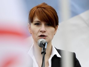 In this photo taken on Sunday, April 21, 2013, Maria Butina, leader of a pro-gun organization in Russia, speaks to a crowd during a rally in support of legalizing the possession of handguns in Moscow, Russia.